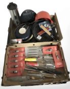 Assorted kitchen wares including chef's knives, wine bottle stoppers, pans, etc.