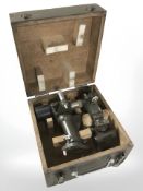 An R Poulin French military telescopic sight, in pine storage box, width 24 cm.