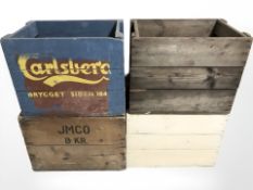 Four vintage painted pine bottle crates, width 48 cm.