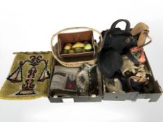 A group of lady's handbags, a gent's bowler style hat, 1970s woolen wall hanging, wicker basket,