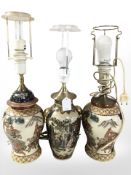 Three 20th century Japanese earthenware lamp bases, tallest 54 cm including fitting.