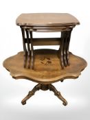 A reproduction nest of three tables and an Italian style coffee table