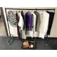 A rail of lady's clothing, leather hand bags, etc. - Image 1 of 2