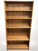 A 20th century teak open bookcase, 89 cm x 30 cm x 181 cm.