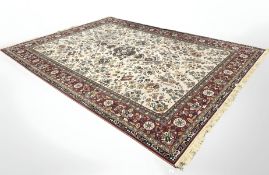 An Indian carpet of Persian design,