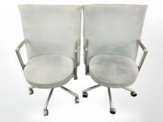 A pair of Danish Erik Jorgensen designed 'Partner' chrome-framed executive swivel armchairs,