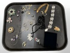 A group of costume jewellery, jet necklace, dress rings, etc.
