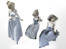 Three Nao figures, No. 402, 1042 and 1089, all boxed.