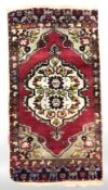 A Turkish hearth rug,