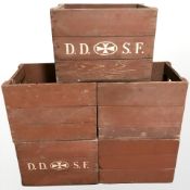 Five vintage painted pine bottle crates, width 48 cm.