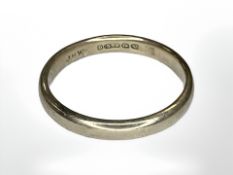 A 9ct yellow gold band ring, size N/O. CONDITION REPORT: 2.5g.