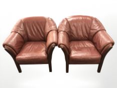 A pair of stained beech framed Burgundy leather armchairs.