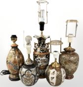 Five 20th century oriental earthenware table lamps, tallest 69 cm including fitting.