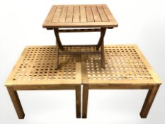 Two teak lattice tables, width 60 cm,