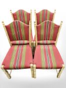Four Danish blond oak armchairs in striped upholstery