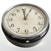 A Smith's circular Bakelite wall timepiece, diameter 17 cm.