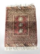 A Turkoman rug, Afghanistan, 74 cm x 53 cm.