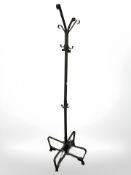A contemporary wrought metal hat and coat stand, height 193 cm.
