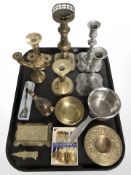 Brass and pewter candlesticks, other metal wares, oil lamp, set of enameled teaspoons, etc.