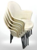 A set of five moulded plastic stacking chairs