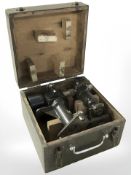 An R Poulin French military telescopic sight, in pine storage box, width 24 cm.