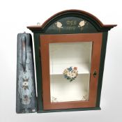 A Scandinavian painted pine single door wall cabinet and a mangle board.