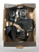 Three Yashica cameras including TL-Electro, Electra 35 and M-II.