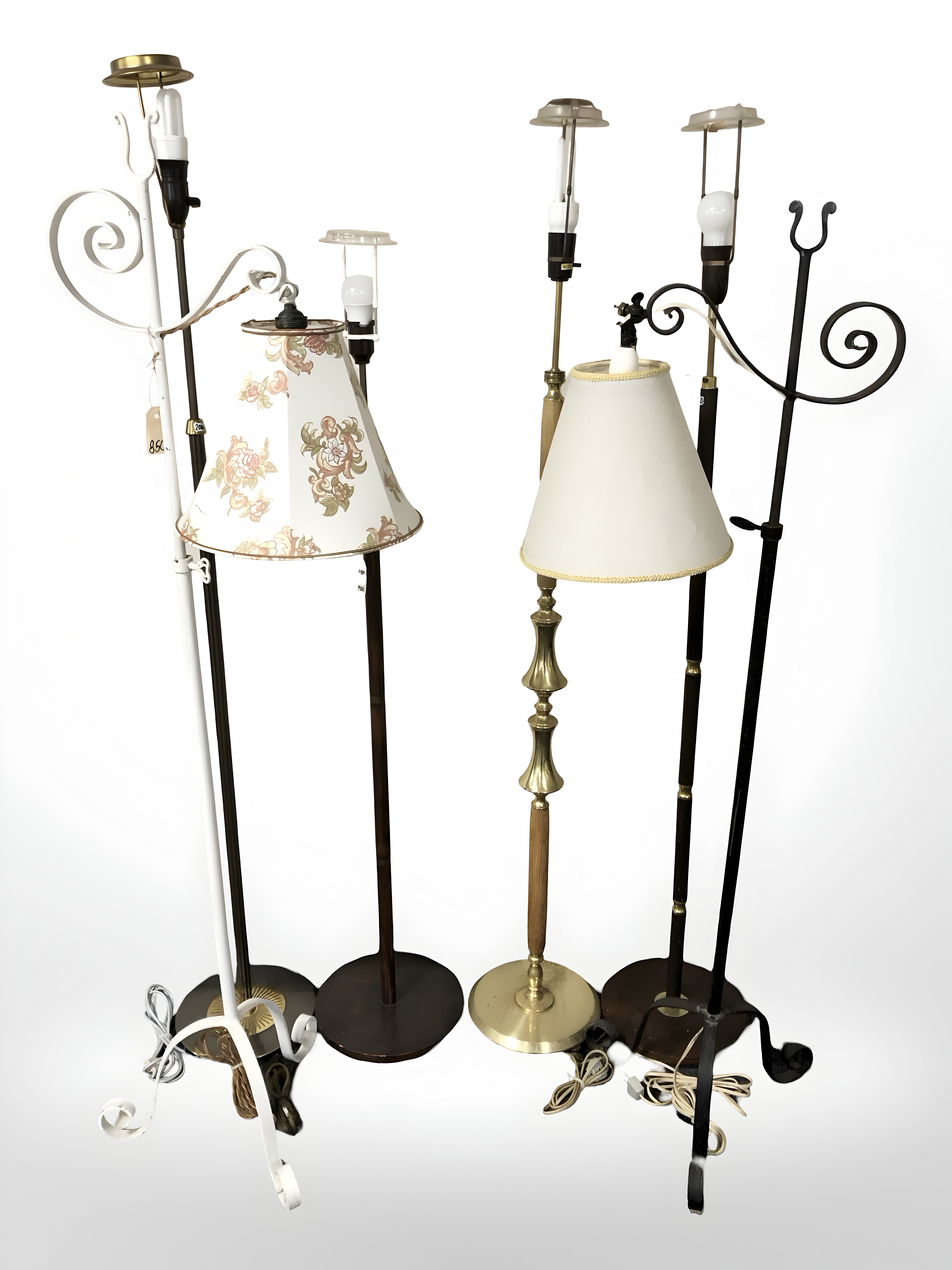 A group of Scandinavian standard lamps in teak, wrought iron, etc.