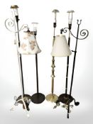 A group of Scandinavian standard lamps in teak, wrought iron, etc.