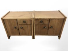 A pair of teak cabinets, width 58 cm.