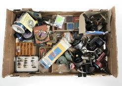 A group of fishing reels, flies and fly making equipment, spools of line, etc.