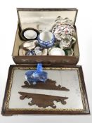 A vintage suitcase containing Ringtons and other ceramics, oriental pictures,