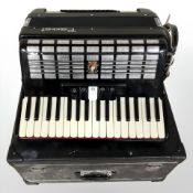 A Parrot accordion in travel case.