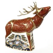 A Royal Crown Derby Sherwood Stag paperweight, with gold stopper,