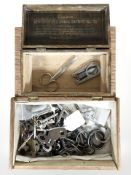 Two small wooden boxes containing antique keys, scissors, etc.