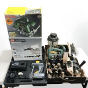 A group of power tools including : Bosch circular saw, Performance Power steam cleaning kit,
