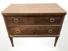 An early 20th century continental mahogany two drawer chest, 90 cm x 46 cm x 73 cm.