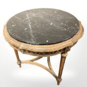 A beech and marble topped occasional table, diameter 55 cm.