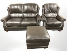 A contemporary brown leather two seater settee,