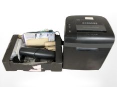A office paper shredder, assorted envelopes and other stationary.