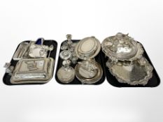 A collection of silver and plate including salvers, entree dishes, candlesticks, candelabrum,
