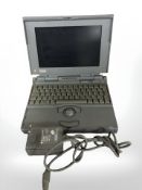 A Macintosh Powerbook 160, with lead.