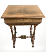A walnut and parquetry inlaid work table with fitted interior, width 57 cm.