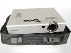 A Panasonic LCD projector model PT-LB10SVE, in carry bag with lead, instructions and remote.