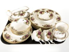 Twenty five pieces of Royal Albert Old Country Roses tea and dinner china.