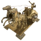 A brass charioteer figure group, length 38 cm.