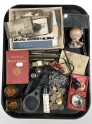 A group of magnifying glasses, lacquered boxes, coins, costume jewellery,