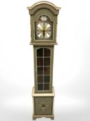 A painted Tempus Fugit longcase clock with pendulum and weights,