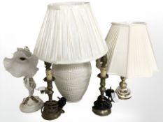 A group of ceramic and metal lamp bases.