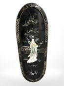 A Japanese export lacquered and hardstone inset panel depicting a geisha, length 90 cm.